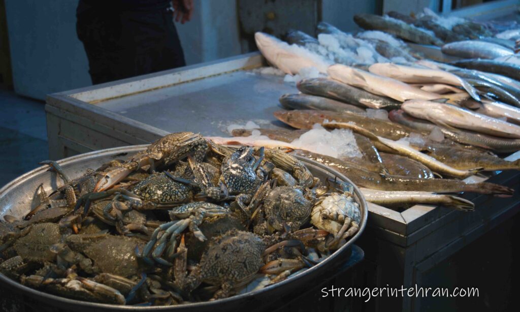 crabs and fish at the fish market in Bushehr